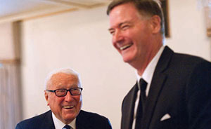Hans Fleischner (left) shares a laugh with Tim Crain, NCCHE director
